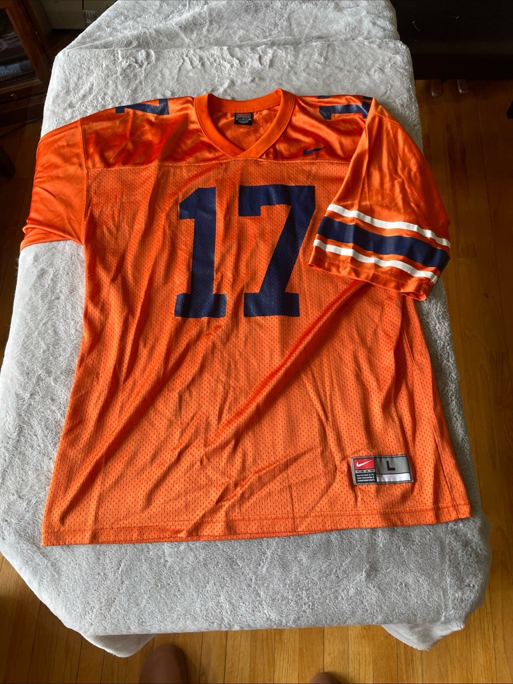 Nike Men’s Orange Football Jersey with Navy Numbers